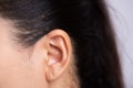 Close up young asian woman ear with Ear piercing. Healthcare and ear cleaning concept Royalty Free Stock Photo