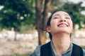 Close up young Asian woman in nature take a deep breath feeling Royalty Free Stock Photo