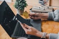 Close up young asian woman holding credit card and using mobile phone. Businesswoman working at home. Online shopping, e Royalty Free Stock Photo