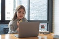 Close up young asian woman holding credit card and using tablet computer. Businesswoman working at home. Online shopping Royalty Free Stock Photo