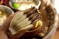 Close up young bananas from banana flower in hand