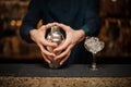 Close up young barmans hands with shaker Royalty Free Stock Photo