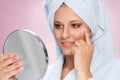 Young beautiful face of girl applying moisturize Royalty Free Stock Photo