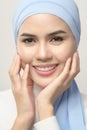 Close up of young beautiful muslim woman with hijab isolated on white background studio, muslim beauty skin care concept Royalty Free Stock Photo