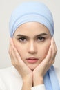 Close up of young beautiful muslim woman with hijab isolated on white background studio, muslim beauty skin care concept Royalty Free Stock Photo