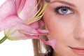 Close up of young beautiful woman with flower Royalty Free Stock Photo