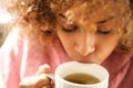 Close up young black woman drinking cup of tea Royalty Free Stock Photo