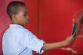 Close-up of a young boy with mobile phone Royalty Free Stock Photo