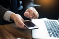 Close up of young business man using mobile smart phone for work Royalty Free Stock Photo