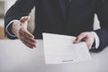 Close up Young Businessman Taking Resume in Office Royalty Free Stock Photo