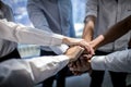 Close up of young businessmen put their hands together. Stack of hands concept of unity and teamwork Royalty Free Stock Photo