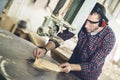 Close up of a young carpenter at work Royalty Free Stock Photo