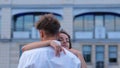 Close up of young couple in elegant clothes dancing together having romantic date on rooftop. Summer romance. Boyfriend Royalty Free Stock Photo