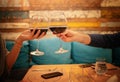 Close up of young couple with glasses of red wine at restaurant Royalty Free Stock Photo