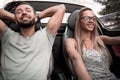 Close up.young couple travelling by car Royalty Free Stock Photo