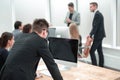Close up. young employees sitting at the office Desk Royalty Free Stock Photo