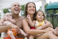 Close-up of young family smiling in swimsuits Royalty Free Stock Photo