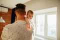 Young father holding his newborn baby son Royalty Free Stock Photo