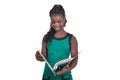 Close up of a young female student holding a binder, smiling