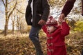 Close Up Of Young Girl On Autumn Walk With Parents Royalty Free Stock Photo