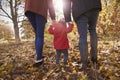 Close Up Of Young Girl On Autumn Walk With Parents Royalty Free Stock Photo