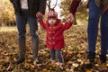 Close Up Of Young Girl On Autumn Walk With Parents Royalty Free Stock Photo