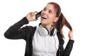 Close up of a young girl with headphones talking on the phone Royalty Free Stock Photo