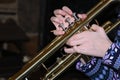 Closeup of a young girl playing the trumpet. Royalty Free Stock Photo