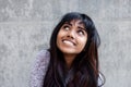 Close up young Indian woman smiling and looking up Royalty Free Stock Photo