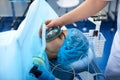 Close up of young lady getting narcosis before the surgery