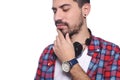 Close up of young latin man serious with black headphones. Royalty Free Stock Photo