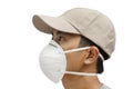 Close up of young male wearing protective face mask on white background Royalty Free Stock Photo