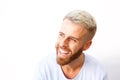 Close up young man with beard laughing against isolated white background Royalty Free Stock Photo