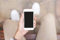 Close up of a young man hand holding using mobile smart phone with screen Royalty Free Stock Photo