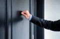 Close up of young man knocking on the door Royalty Free Stock Photo