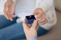 Close up young man making proposal to beloved woman. Royalty Free Stock Photo