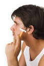 Close up of young man shaving Royalty Free Stock Photo