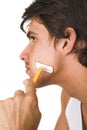 Close up of young man shaving Royalty Free Stock Photo