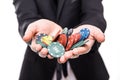 Close up young man in suit holding up win poker chips at game Royalty Free Stock Photo