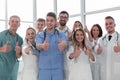 Close up. young medical professionals showing thumbs up