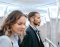 young people communicate standing at the subway station. Royalty Free Stock Photo