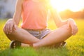 Close up of young pretty child girl relaxing on green grass lawn on warm summer day Royalty Free Stock Photo