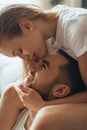 Close-up of young romantic couple is kissing and enjoying the company of each other at home Royalty Free Stock Photo