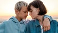 Close up of young sensual lesbian couple going to kiss, Two women enjoying romantic moments together at sunrise Royalty Free Stock Photo