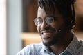 Friendly black man call center operator in headphones contact client Royalty Free Stock Photo