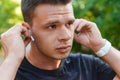 Close up of a young sportsman in earphones Royalty Free Stock Photo