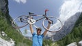 CLOSE UP: Young sportsman shouts for joy as he celebrates bicycle race victory.