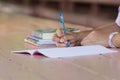 Close up of young student hands writing on notebook Royalty Free Stock Photo