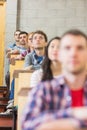 Close up of young students sitting in classroom Royalty Free Stock Photo