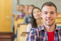 Close up of young students sitting in classroom Royalty Free Stock Photo